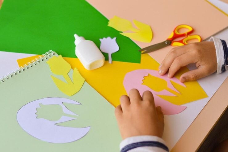 Kids make paper crafts